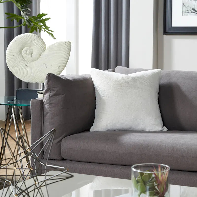 Ensemble canapé trois places et fauteuil en tissu avec coussins et dossiers