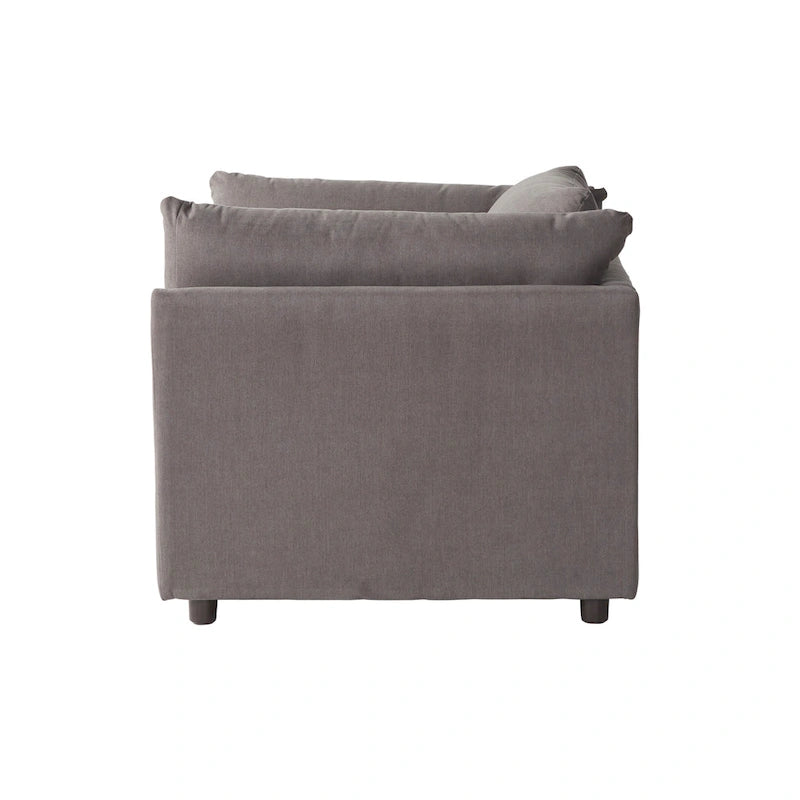 Ensemble canapé trois places et fauteuil en tissu avec coussins et dossiers